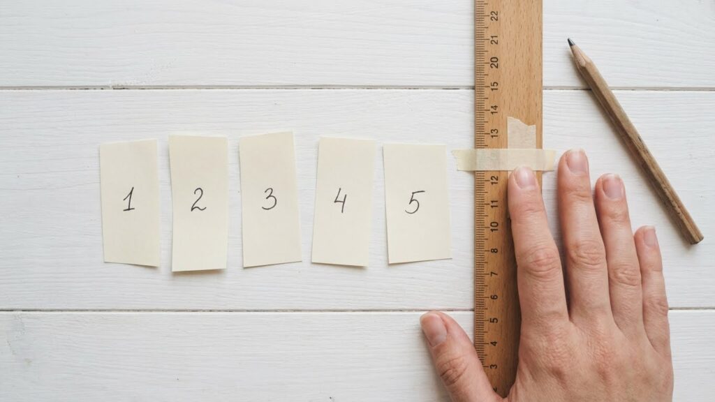 Measuring and Cutting the Paper Nails