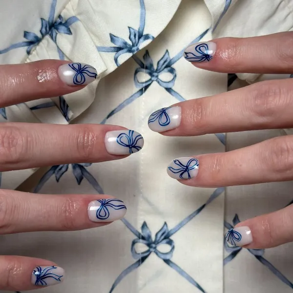 Simple Blue Bow Valentine’s Day Nail Design