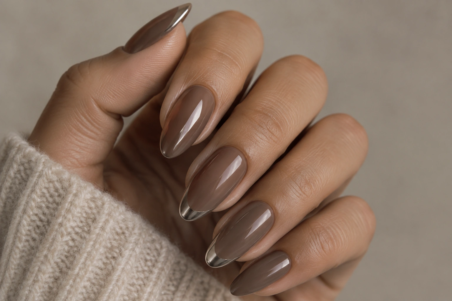 Medium mocha nails with chrome accents and glossy shine